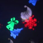 Περιστρεφόμενη Χριστουγεννιάτικη LED λάμπα E27, προβάλει νιφάδες, χιονάνθρωπους, ευχές και ελαφάκια